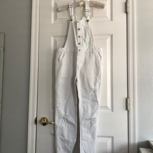 Girls Ripped White overalls.